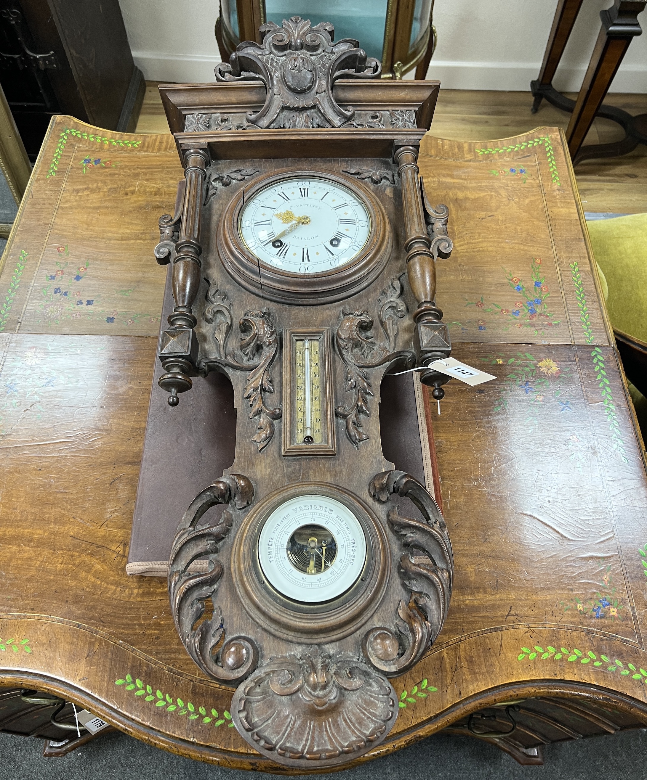 A late 19th century French carved walnut wall clock combined thermometer and barometer, dial and movement marked J Baptiste Baillon, Paris, height 93cm